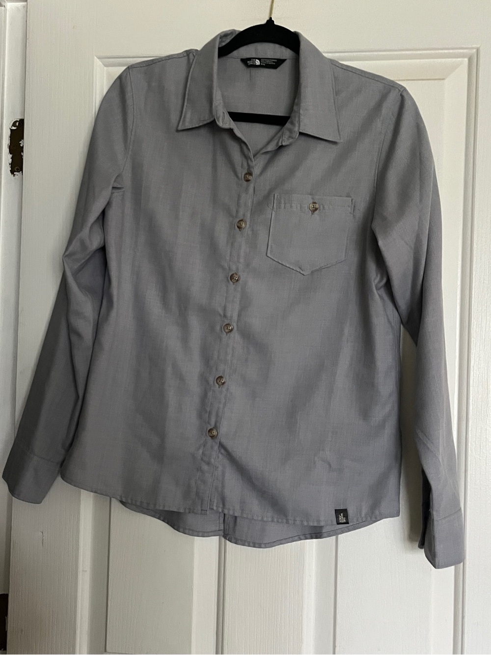 The North Face women’s gray button-up shirt in size M #outdoor